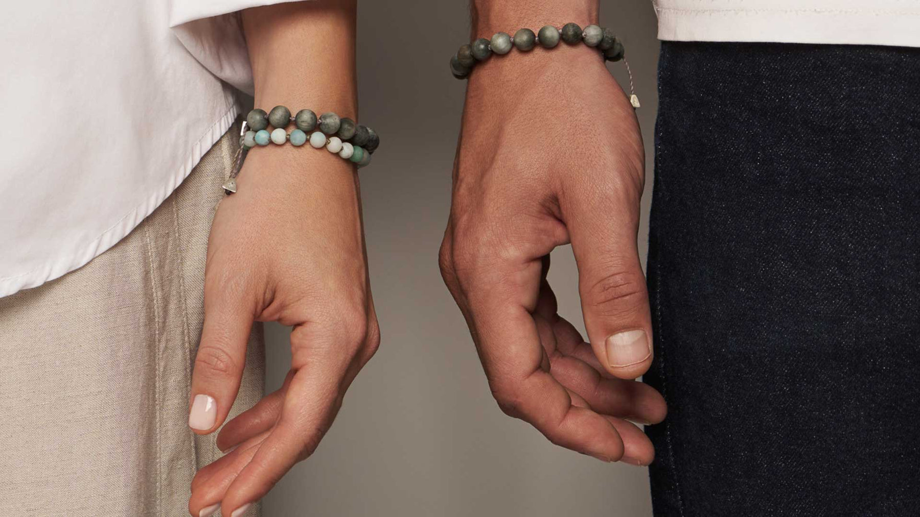 woman and man closeup hands with jewelry f zeen boutique